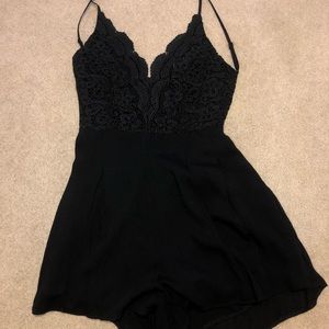 Black romper with lace and open back!